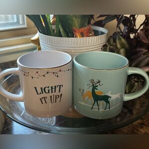 2- Christmas mugs, Christmas lights and deer.🎄☕️